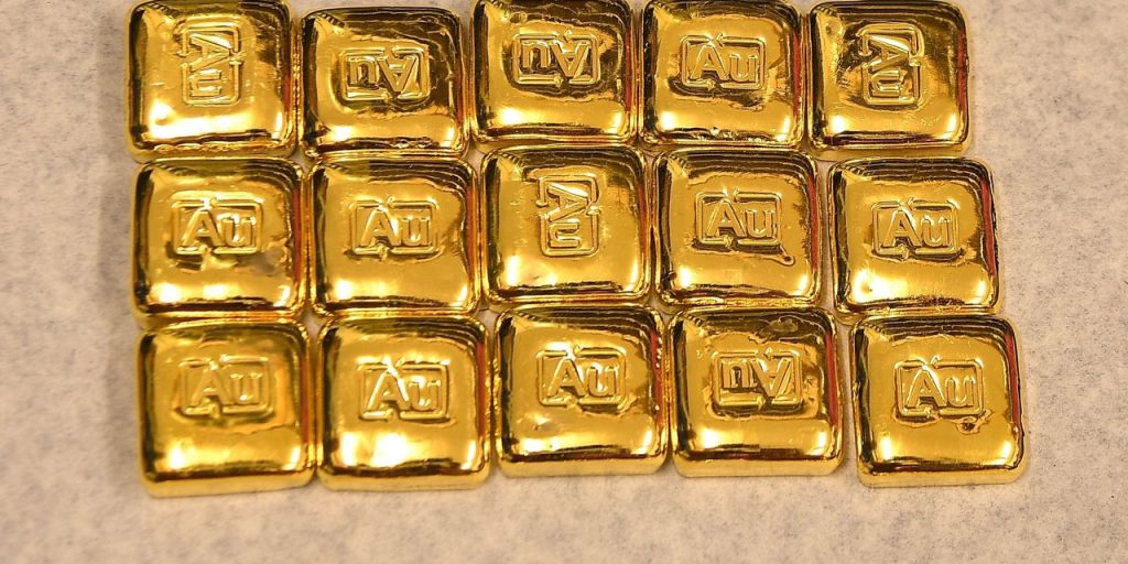 Gold ends higher, then falls after Fed holds key interest rate unchanged