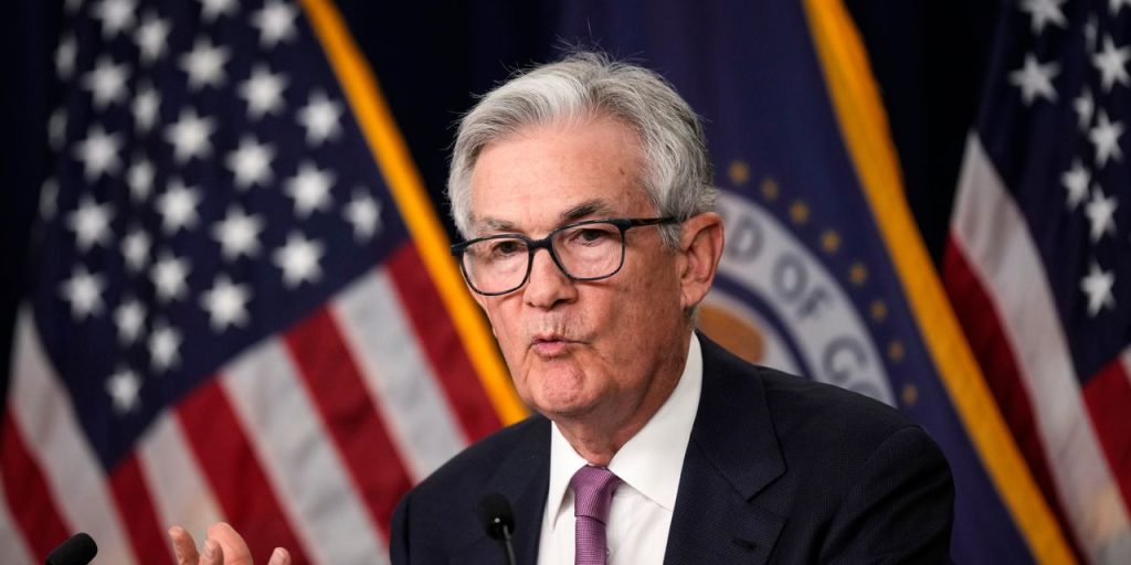 Powell tells Congress to expect higher interest rates