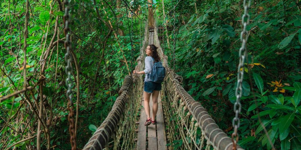 How to have fun traveling solo—and save money, too