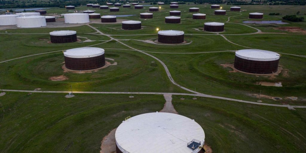 Oil prices finish lower as U.S. crude supplies mark a 2-week climb of more than 17 million barrels