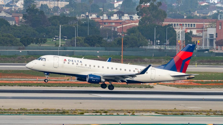 Delta air plane taking off